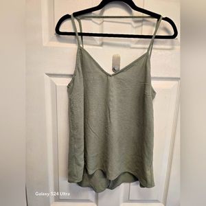 Womans greenish tank